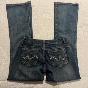 vintage rue 21 low rise flare jeans with cute detailing on pockets